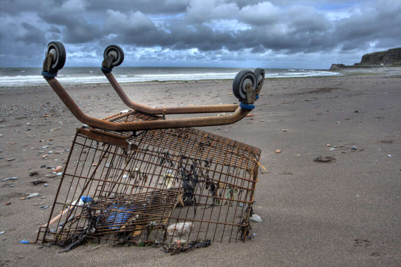 Image of a cart washed up on the beach.