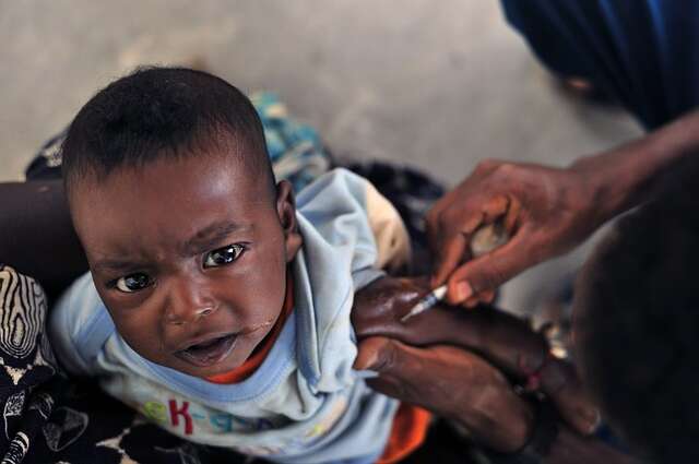 Child receiving the malaria vaccine in Ghana. Image Courtesy: tpsdave