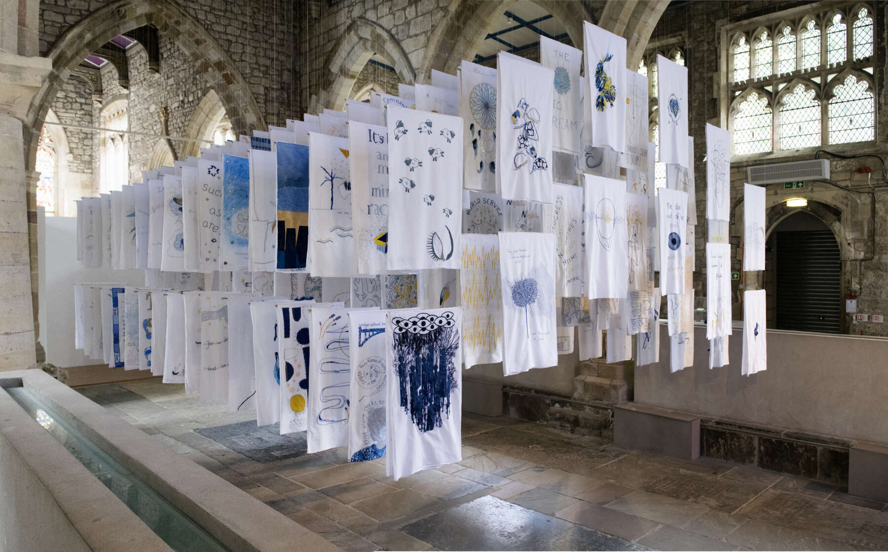 1001 Nights, installation of embroidered pillowcases, Susan Aldworth, 2017. Shown in The Dark Self, York St Mary’s, 2017. Photograph by Paul Hughes