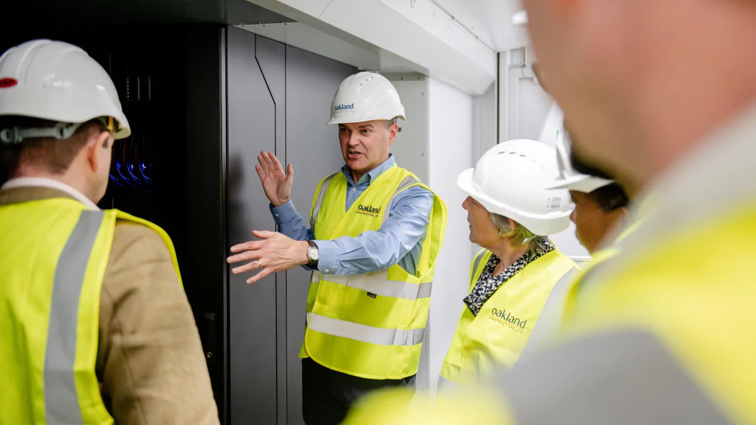 Image of Professor Simon McIntosh-Smith describing a supercomputer